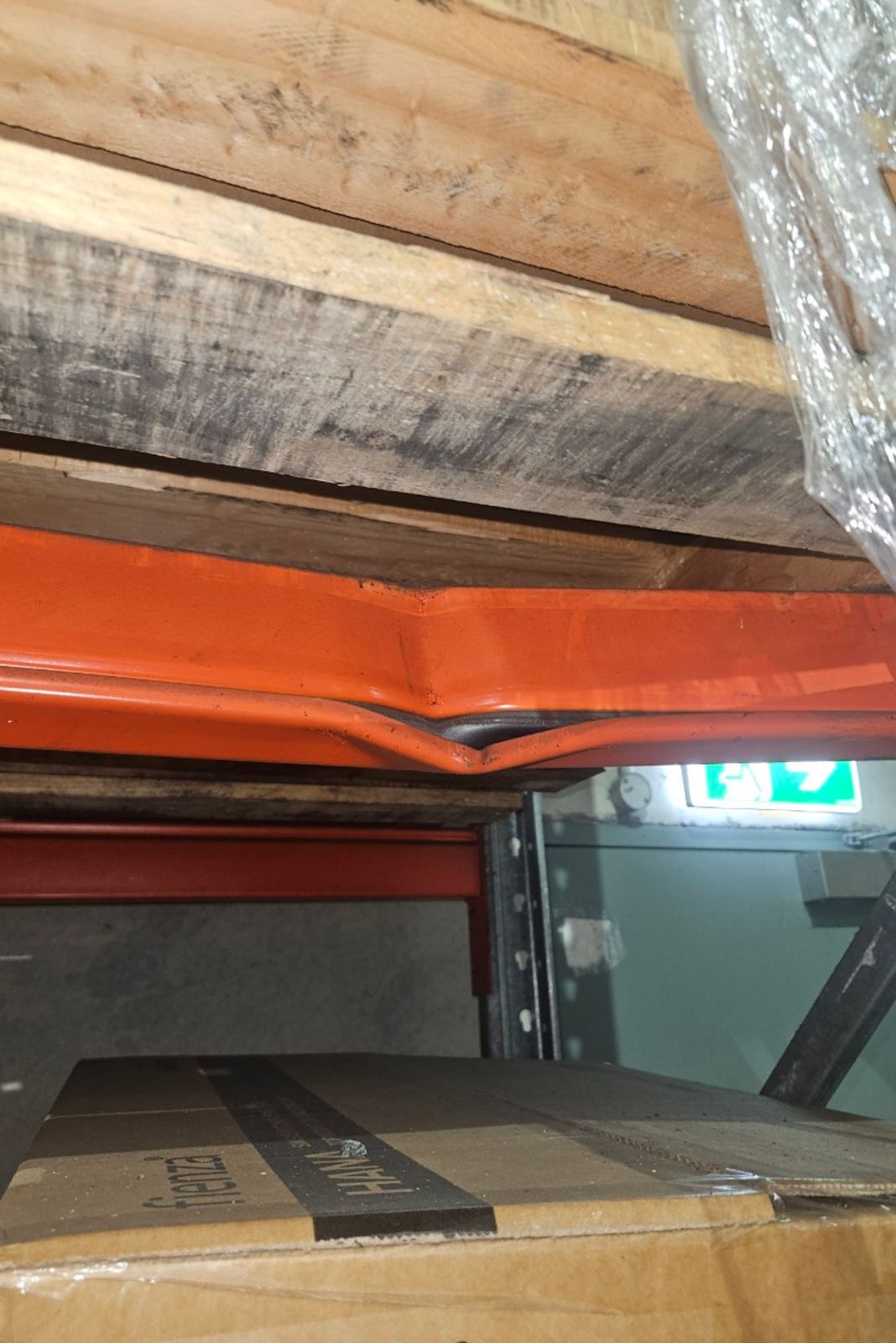 Forklift damage to pallet racking beam
